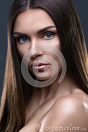 Portrait of beautiful woman with glistening hair Stock Photo