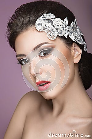 Portrait of a beautiful woman in the image of the bride with lace in her hair. Beauty face.Hairstyle back view Stock Photo