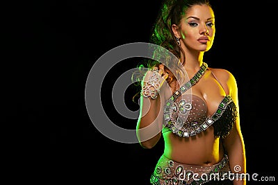 Portrait of beautiful woman, traditional ballydance dancer. Ethnic dance. Belly dancing. Tribal dancing. Stock Photo