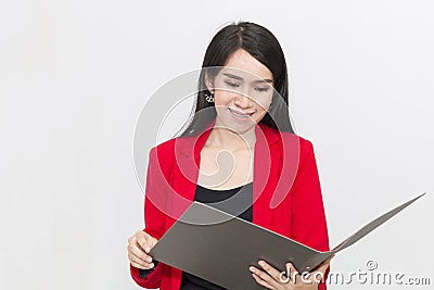 Portrait of beautiful 20-30 years.Young businesswoman in red suit Stock Photo