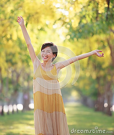 Portrait of beautiful young asian woman feeling free with relaxi Stock Photo