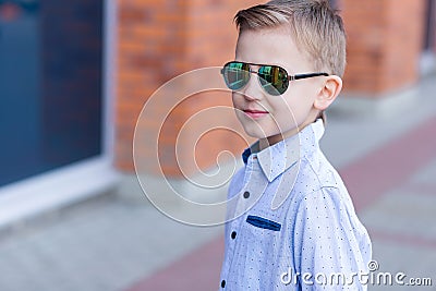 Portrait of a beautiful young boy outdoors Stock Photo