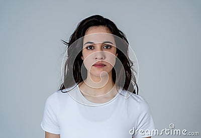 Portrait of beautiful young latin woman with angry and furious face. Human expressions and emotions Stock Photo