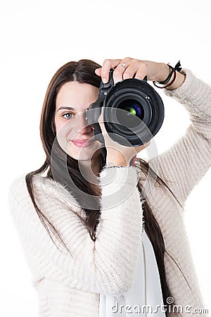 Beautiful young woman trainer photographer taking pictures in white background Stock Photo