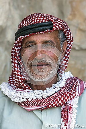 A portrait of a Bedouin man wearing traditional headware in Jordan. Editorial Stock Photo