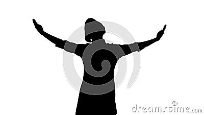 Portrait of black silhouette of cook girl raising hands and head up. Stock Photo