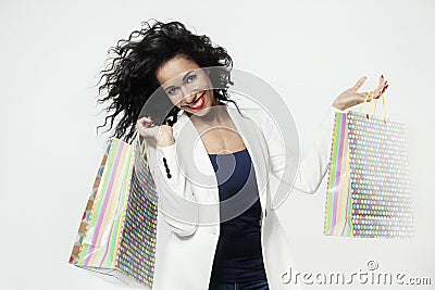 Portrait of black woman happy with perfect shopping paper bags, smiling face Stock Photo