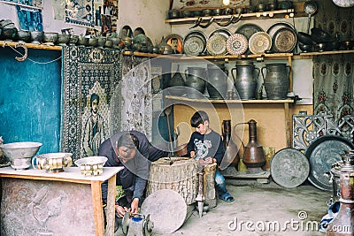 Portrait of Blacksmith and his son from Lahic. Copper production and utensils in Lahiche - the center of handicraft production Editorial Stock Photo