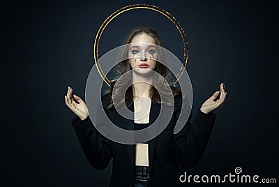 Portrait of blond sexy woman with long hair halo nimbus over her head on black background. Perfect girl with nimb, beautiful eyes Stock Photo