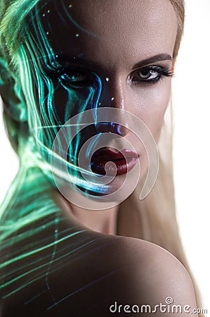 Portrait of blond Woman with shining lights on face Stock Photo