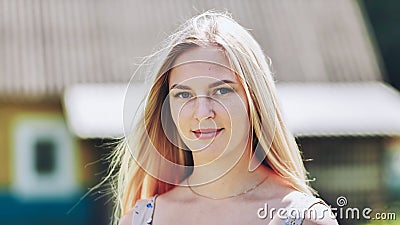 Portrait of a blonde girl of Slavic appearance. Close-up face. Stock Photo
