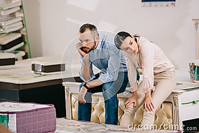 portrait of bored couple in furniture store Stock Photo