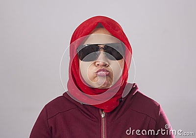 Bored Lazy Muslim Lady in Red Stock Photo