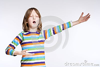 Portrait of a Boy Acting as Opera Singer Stock Photo