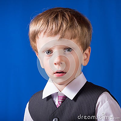 Portrait of the boy of the blonde with blue eyes Stock Photo