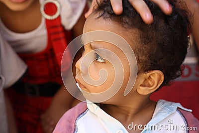 Portrait of a boy face close up at charity event in giza, egypt Editorial Stock Photo