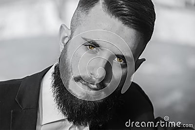 Portrait of a boy with yellow eyes in black and white Stock Photo