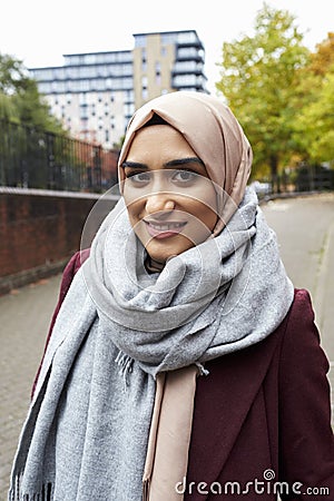 Portrait Of British Muslim Woman In Urban Environment Stock Photo