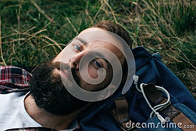 Portrait brutal bearded hipster man in the forest Stock Photo