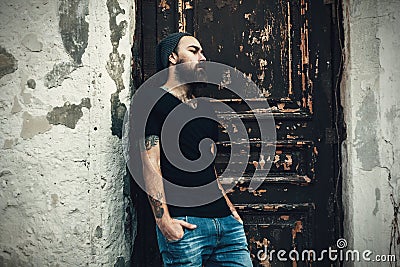 Portrait of brutal bearded man wearing blank t-shirt Stock Photo