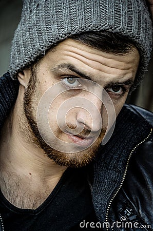 Portrait of brutal young man. Bad boy concept. Stock Photo