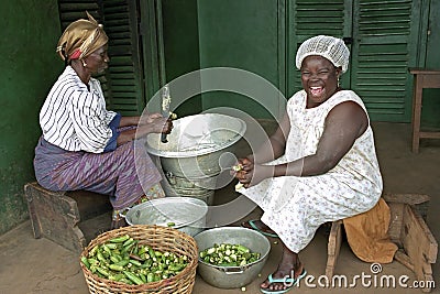 Portrait of burst of laughter Ghanaian cook Editorial Stock Photo