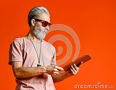 Portrait of Businessman holding a tablet pc Stock Photo