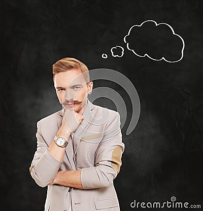 Portrait of a businessman with thinking cloud Stock Photo