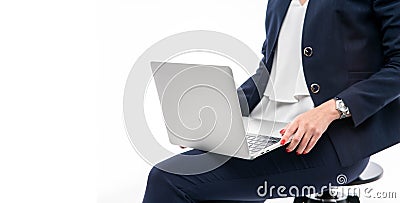 Portrait businesswoman holding silver laptop in the office over white background Stock Photo