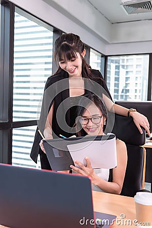 Portrait of Businesswomen are Woking on Their Table Desktop in Office Workplace, Occupation and Career Concept Stock Photo