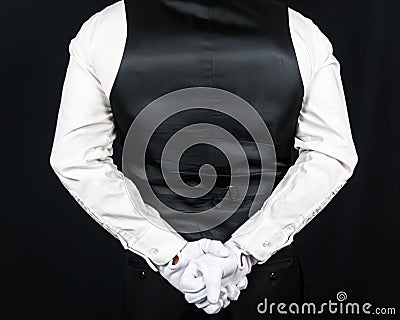 Portrait of Butler or Waiter in White Gloves With Hands Behind His Back Stock Photo