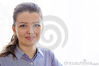 Portrait calm smiling girl, positive young Caucasian woman with blue eyes, light brown, fair hair, Stock Photo