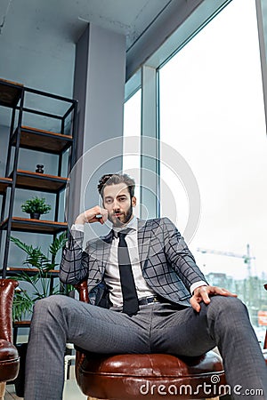Portrait of young caucasian boss in tuxedo Stock Photo