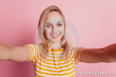 Portrait of charming lady take selfie toothy shiny smile on pink background Stock Photo
