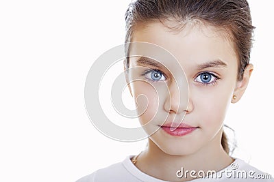 Portrait of a charming little girl smiling at camera Stock Photo