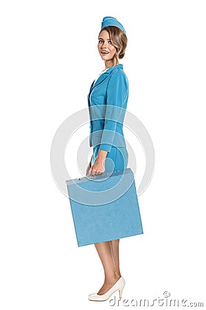 Portrait of charming stewardess wearing in blue uniform. Stock Photo