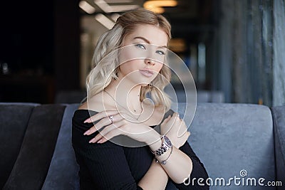 Portrait charming young woman with friendly smile, long blonde hair smiling Stock Photo