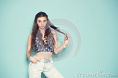 Portrait of cheerful fashion hipster girl going Stock Photo
