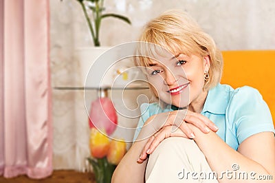 Portrait of cheerful mature woman Stock Photo