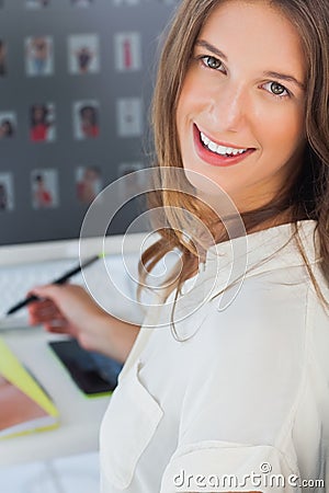 Portrait of a cheerful photo editor Stock Photo