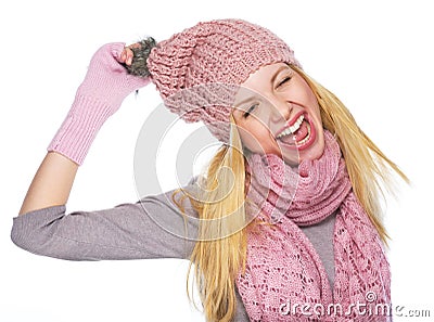 Portrait of cheerful teenager girl in winter hat and scarf Stock Photo