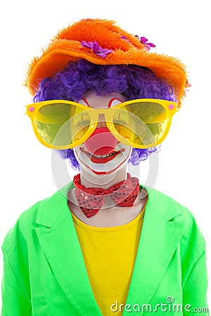 Portrait of child dressed as colorful funny clown Stock Photo