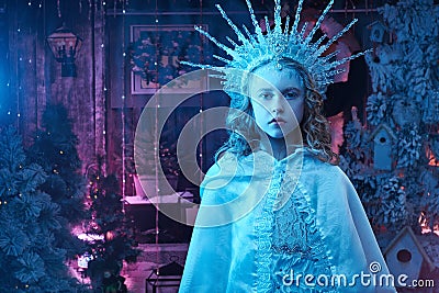 Portrait of the child of the snow queen in the crown. fairy tale concept Stock Photo