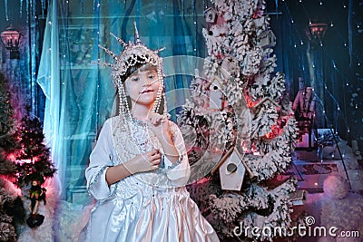 Portrait of the child of the snow queen in the crown. fairy tale concept Stock Photo