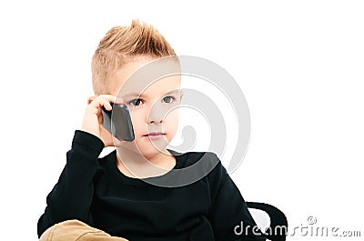 Portrait of a child speaking by phone Stock Photo