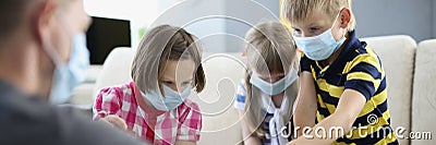 Children wearing face mask, virus spread in kindergarten, covid spread prevention Stock Photo