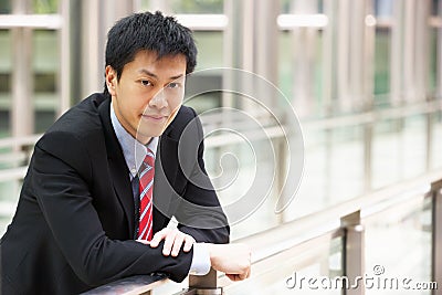 Portrait Of Chinese Businessman Outside Office Stock Photo