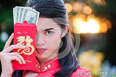 Portrait chinese woman red dress traditional cheongsam in chines Stock Photo
