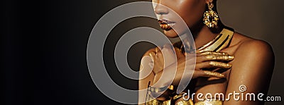 Portrait Closeup Beauty fantasy african woman, face in gold paint. Golden shiny black skin. Fashion model girl mixed Stock Photo