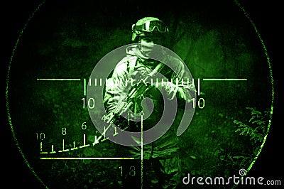 Portrait of a commando in the night sight of a sniper rifle. The concept of military operations, international conflicts, special Stock Photo